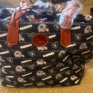 Dooney & Bourke Black and Brown Raiders Backpack